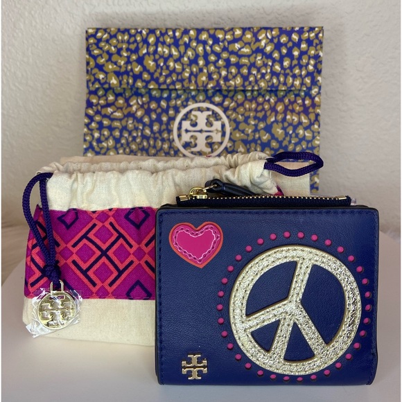 Tory Burch Handbags - Tory Burch Like New Peace Leather Mini Wallet- Full Inclusion